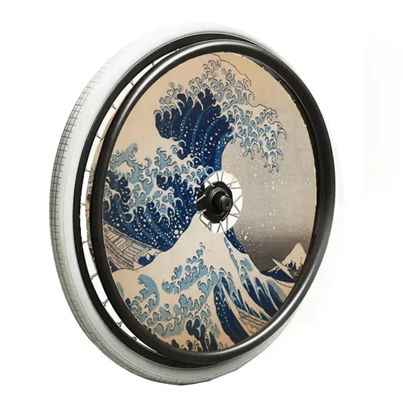 Wheelchair wheel with spoke guard featuring Great Wave off Kanagawa artwork design