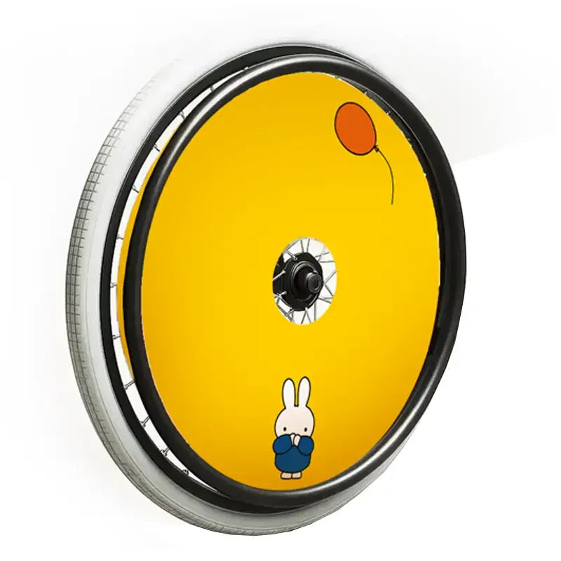 Children's wheelchair spoke guard with yellow background, cartoon bunny, and orange balloon design