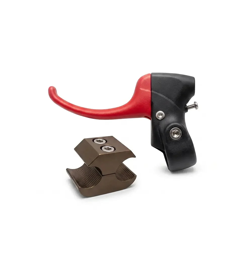 Red and black wheelchair brake lever with bronze clamp for secure attachment