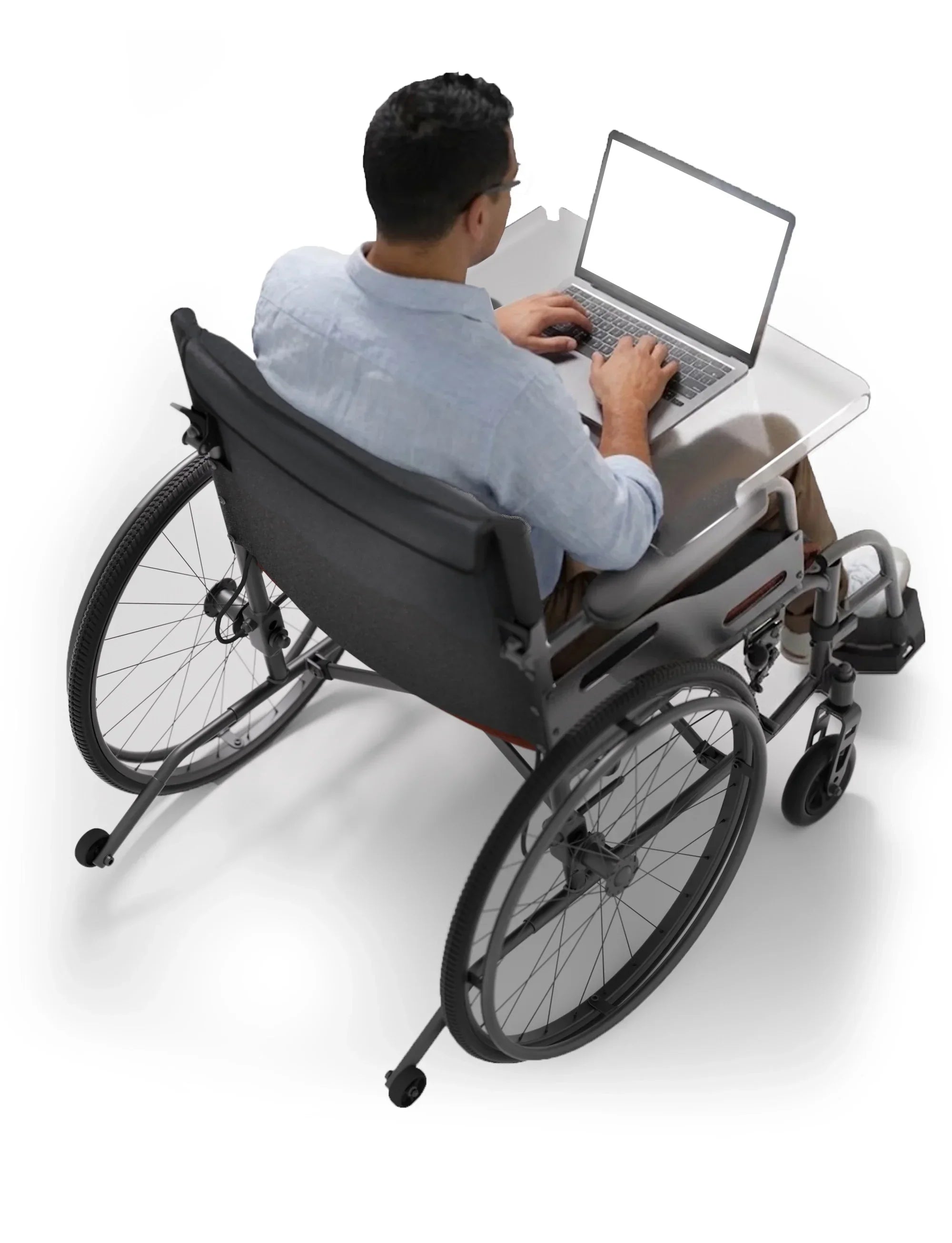 Man using wheelchair with clear tray table and spoke guards while working on laptop