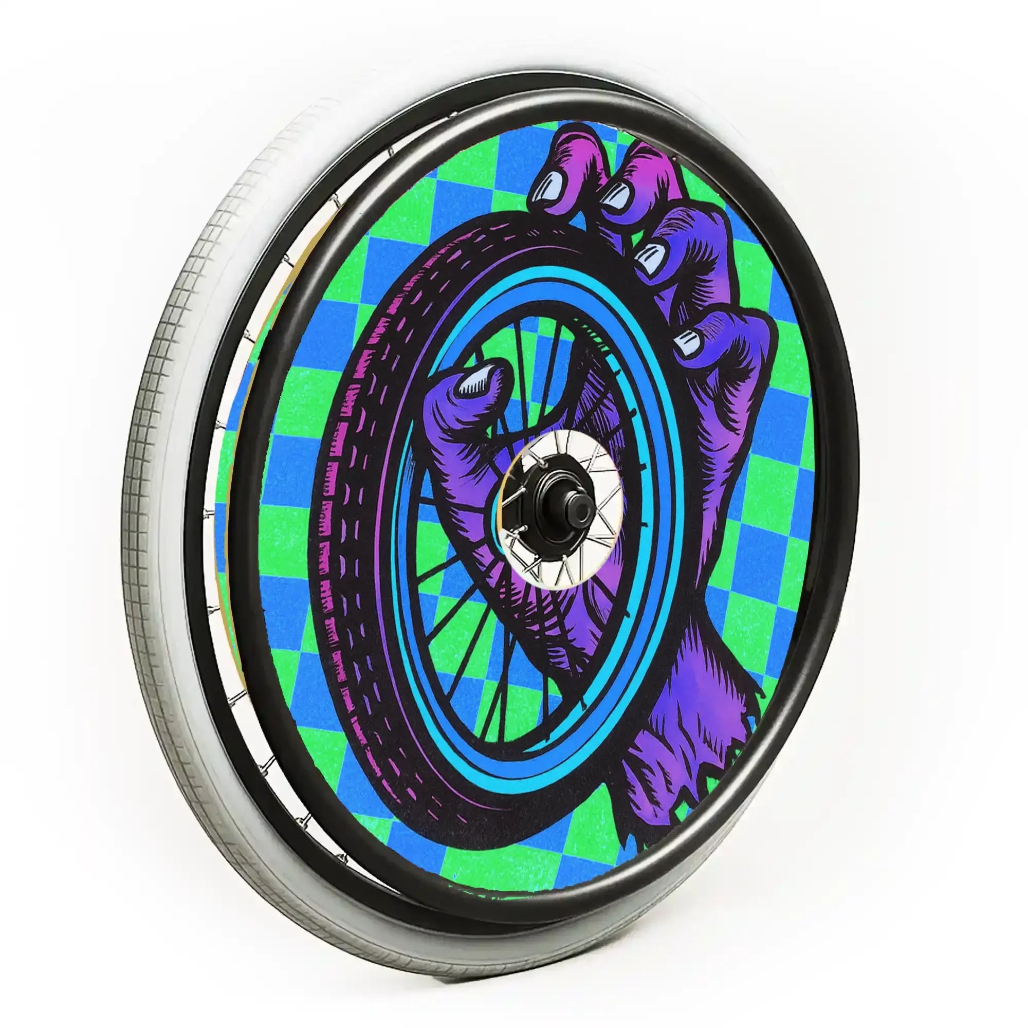 Colorful spoke guard on wheelchair wheel with graphic hand and blue-green checkered pattern