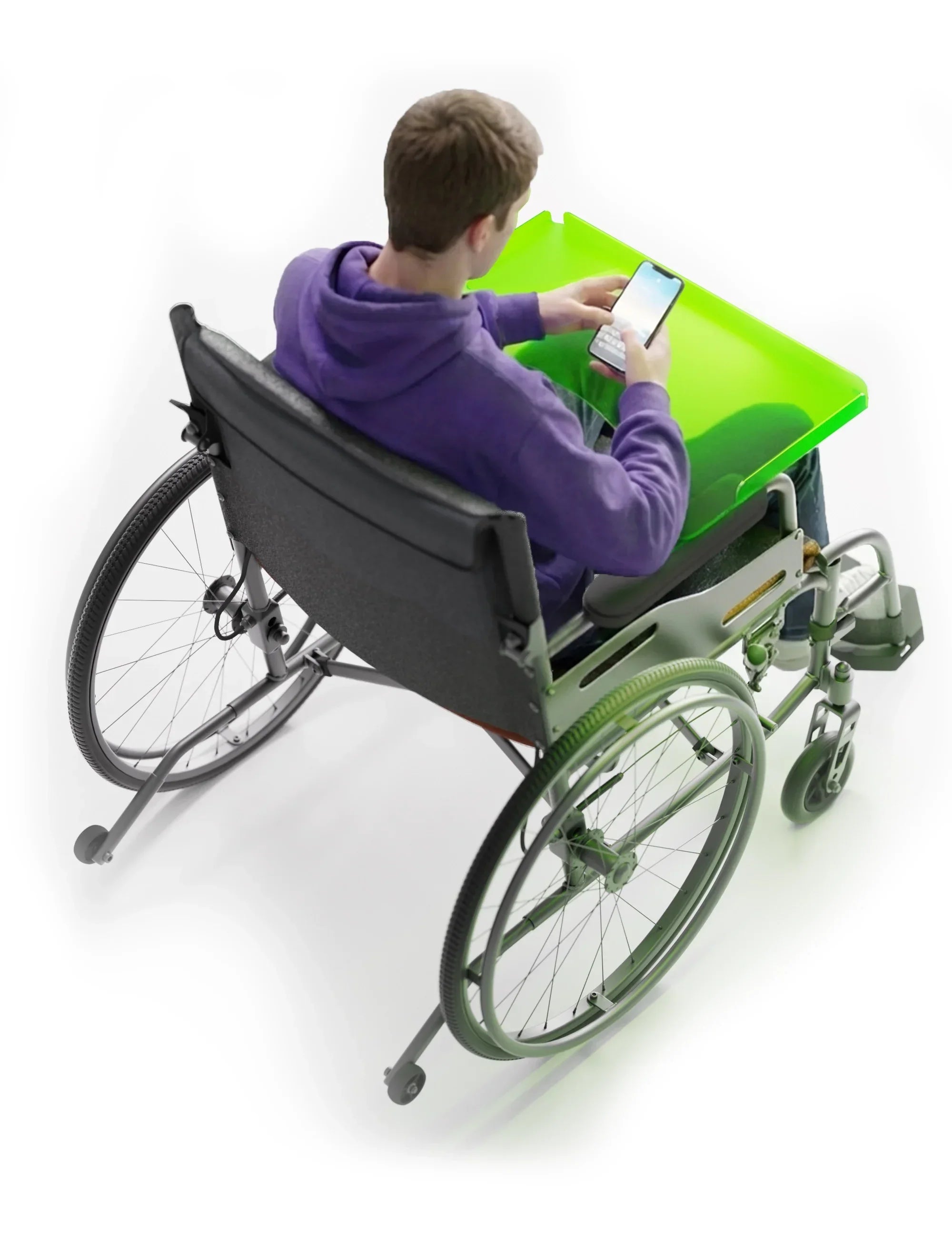 Person in wheelchair using a bright green wheelchair tray, holding a smartphone