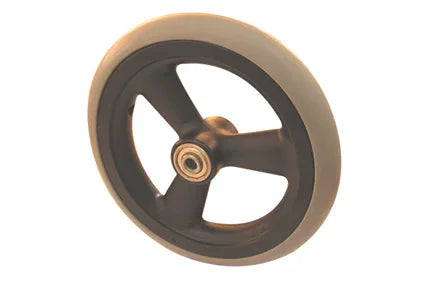 Durable wheelchair wheel with black rim and beige tire, designed for smooth mobility and everyday use.