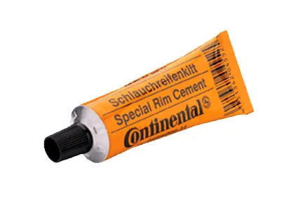 Tube Continental Special Rim Cement voor fietsbandreparatie, oranje verpakking met zwarte dop