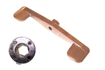 Copper wheelchair footrest with textured pads and hex mounting plate for secure attachment