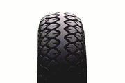 Durable wheelchair tire with deep tread pattern for enhanced grip and mobility