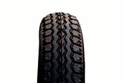 Durable wheelchair tire with deep tread pattern for reliable mobility and traction