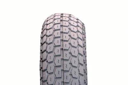 Durable wheelchair tire with hexagonal tread pattern for enhanced grip and smooth mobility
