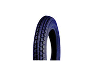 Durable wheelchair tire with deep tread pattern for reliable mobility and grip