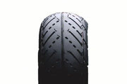 Durable wheelchair tire with deep tread pattern for reliable mobility and grip