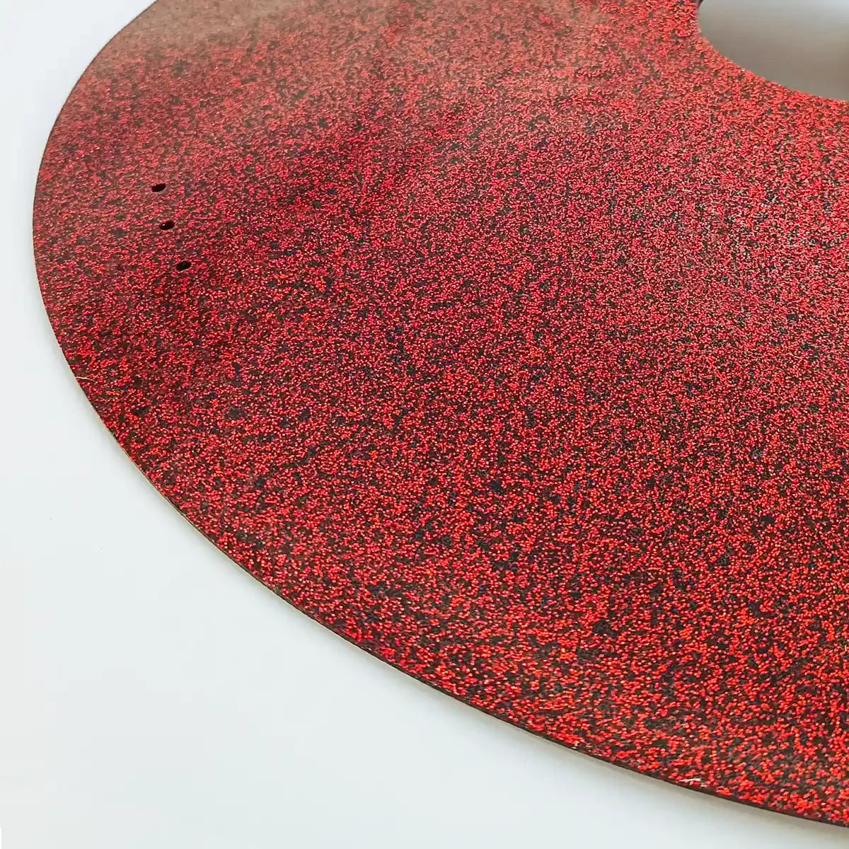 Red speckled wheelchair tray with mounting holes for secure attachment