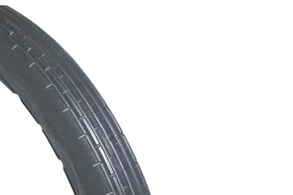 Durable wheelchair tire with deep tread pattern for reliable mobility and grip
