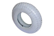 White wheelchair tire with rugged tread pattern for durable mobility support