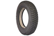 Durable wheelchair tire with deep tread pattern for enhanced grip and mobility