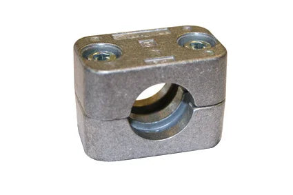 Metal wheelchair component with circular opening and bolt holes for secure attachment