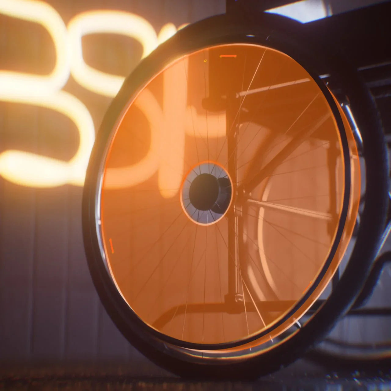Close-up of wheelchair wheel with vibrant orange neon spoke cover in modern lighting