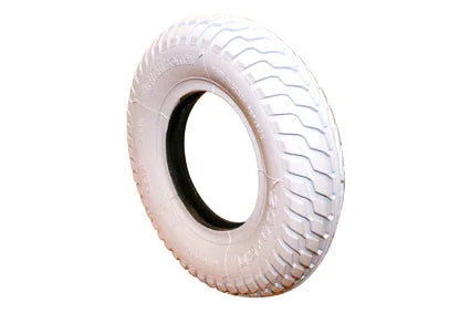 White wheelchair tire with deep tread pattern, durable rubber construction for mobility aid use