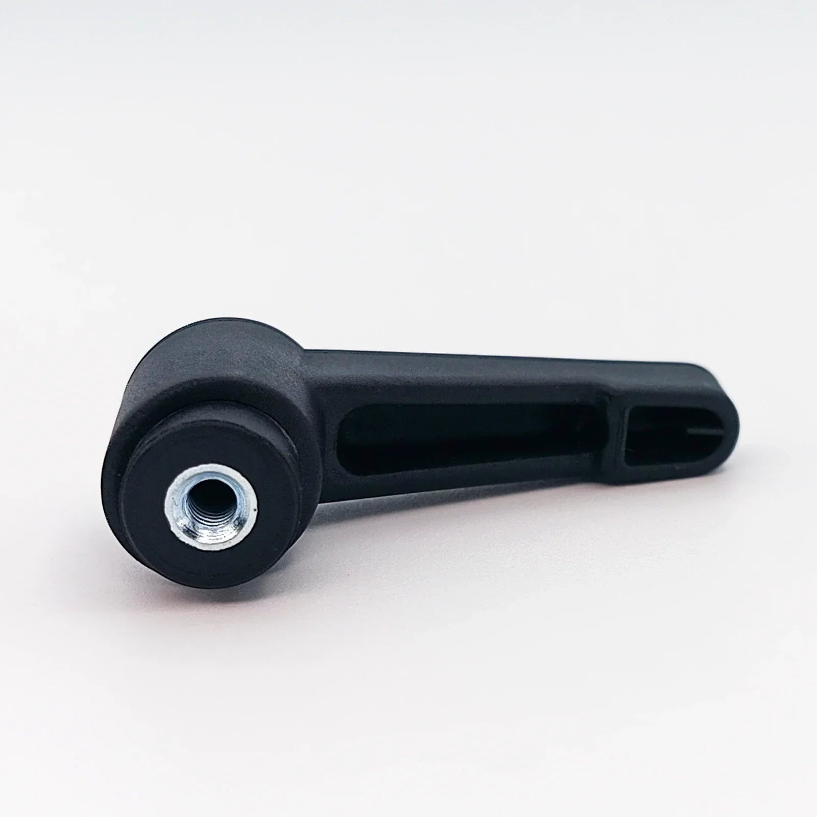 Black wheelchair accessory with threaded hole for secure attachment