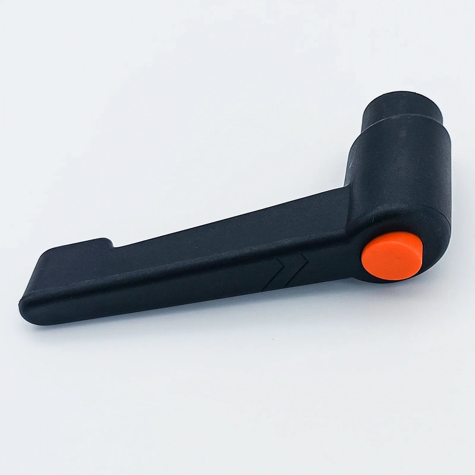 Black wheelchair accessory with orange button, durable and ergonomic design