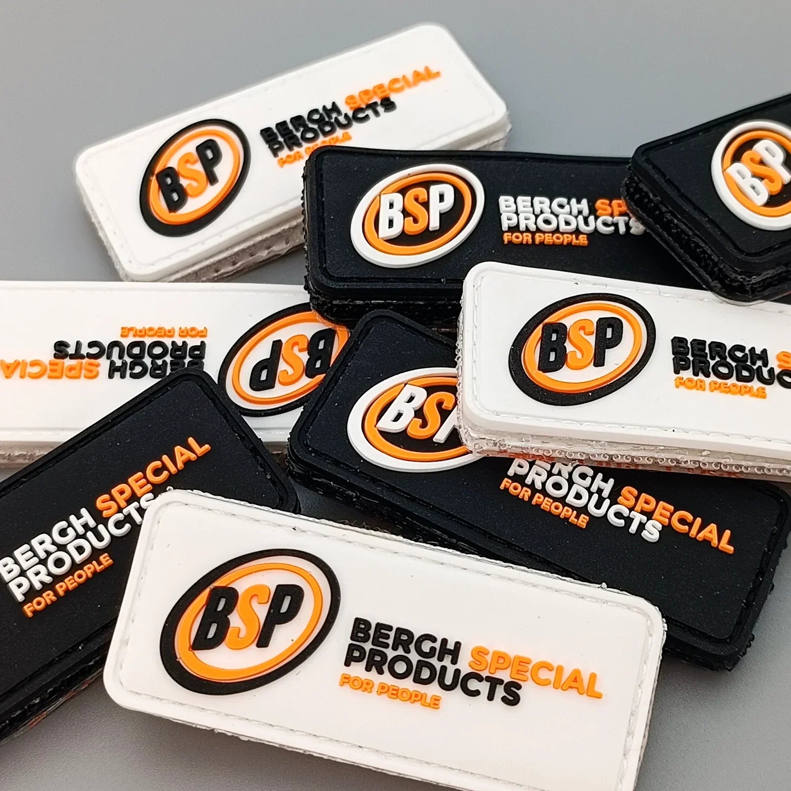 BSP branded patches for wheelchair accessories, featuring Bergh Special Products logo in black and white with orange accents.