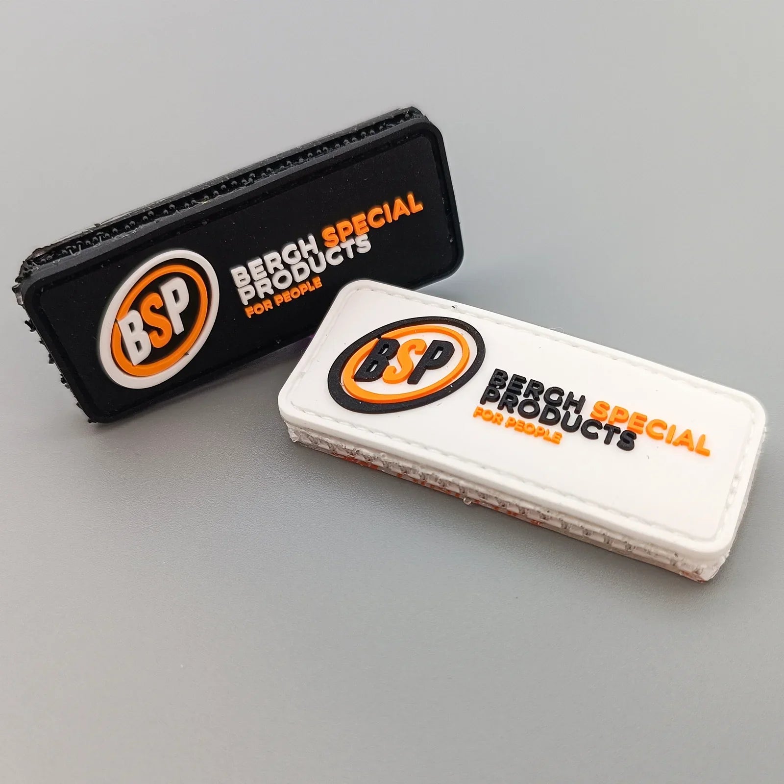Black and white Bergh Special Products patches with BSP logo, for wheelchair accessories branding