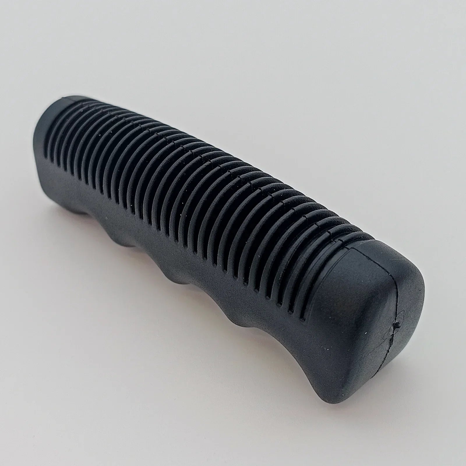Black ribbed wheelchair hand grip for secure push rim handling
