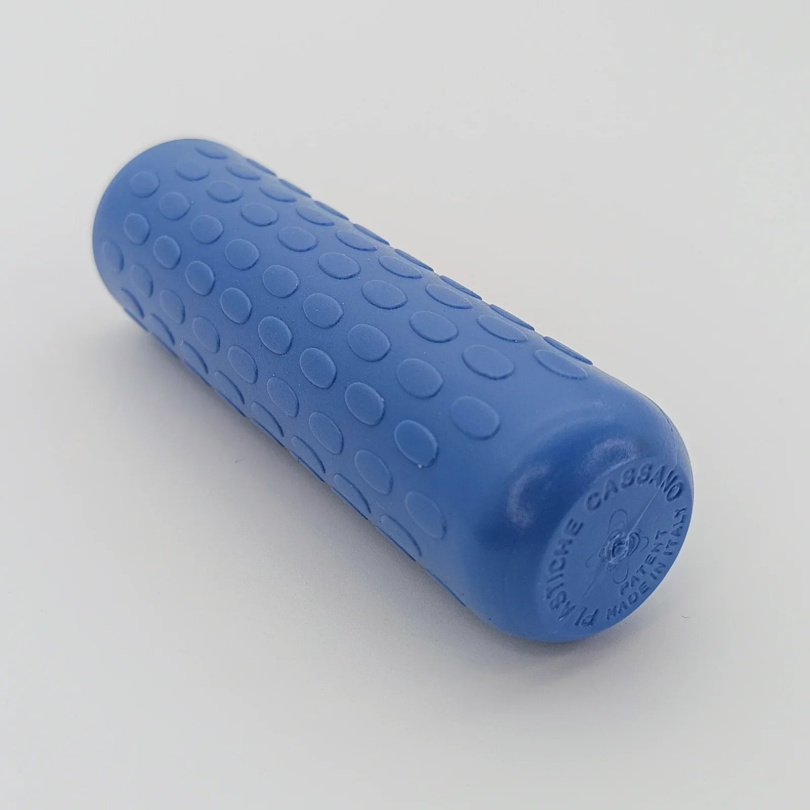 Blue textured wheelchair hand grip with non-slip dots, made in Italy for secure handling