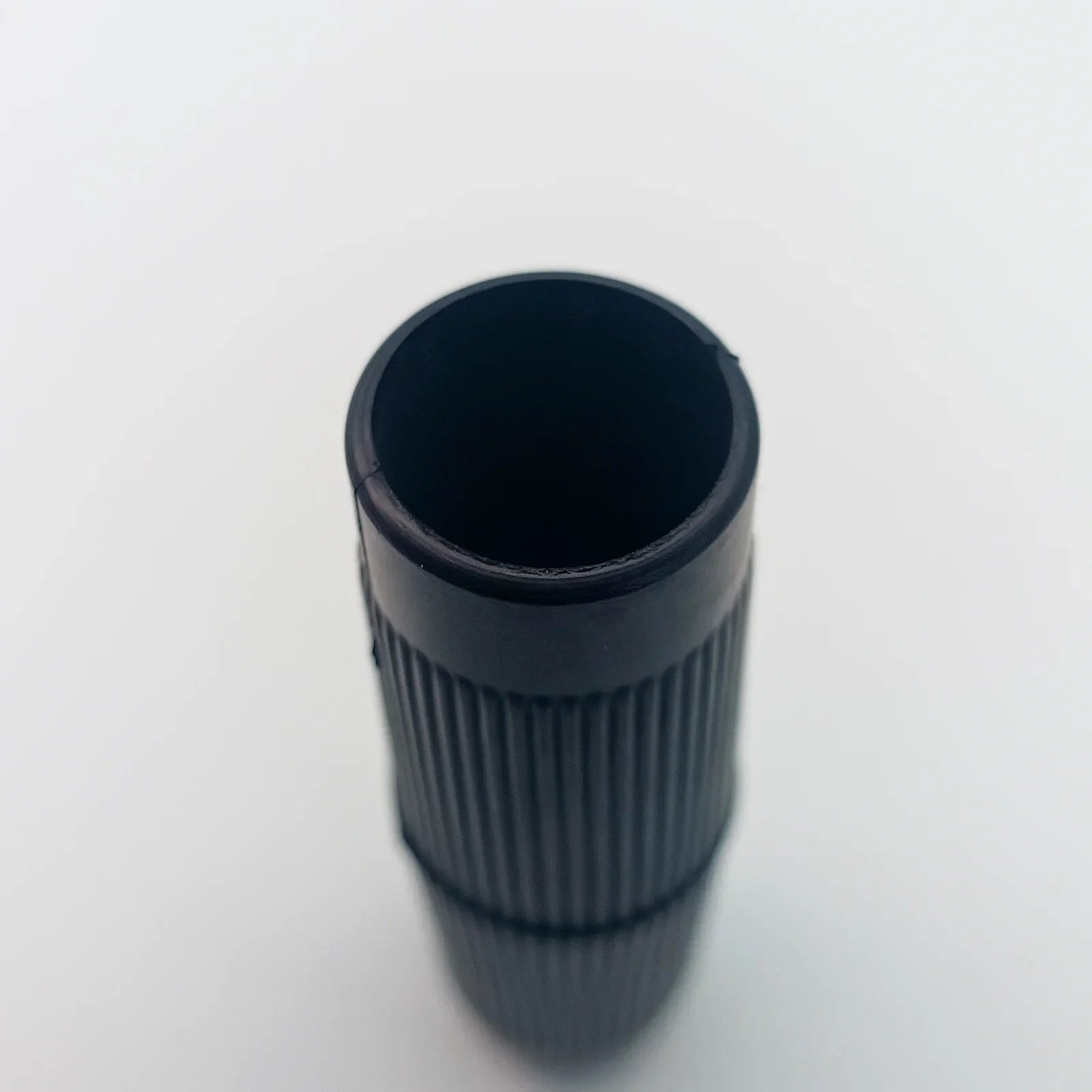 Black ribbed wheelchair accessory grip, durable replacement part for mobility equipment