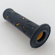 Black textured wheelchair handrim grip with yellow accents for secure push rim control