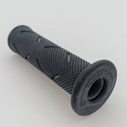 Black textured wheelchair grip with ergonomic design for secure handling and comfort