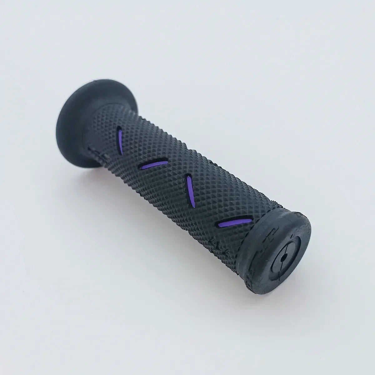 Black textured wheelchair grip with purple accents, ergonomic design for secure handling