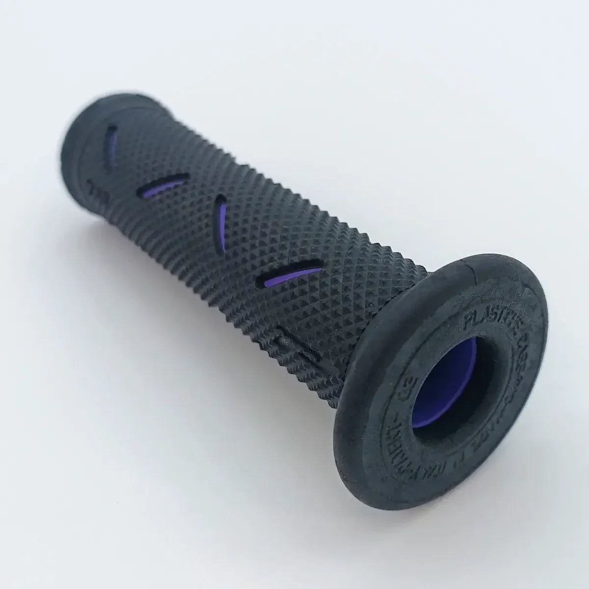 Black textured wheelchair grip with purple accents, durable ergonomic handle for mobility aids