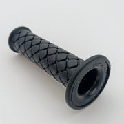 Black textured wheelchair grip with ergonomic design for secure handling and comfort