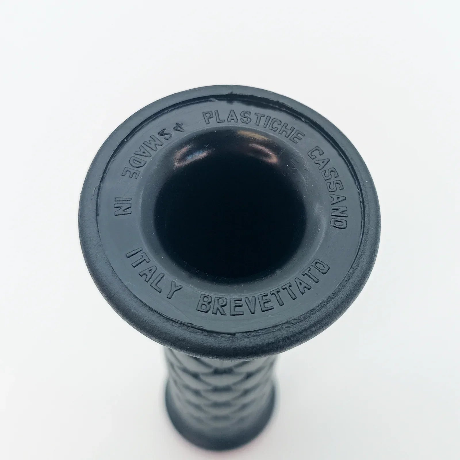 Black wheelchair grip with textured handle, made in Italy, for durable mobility support