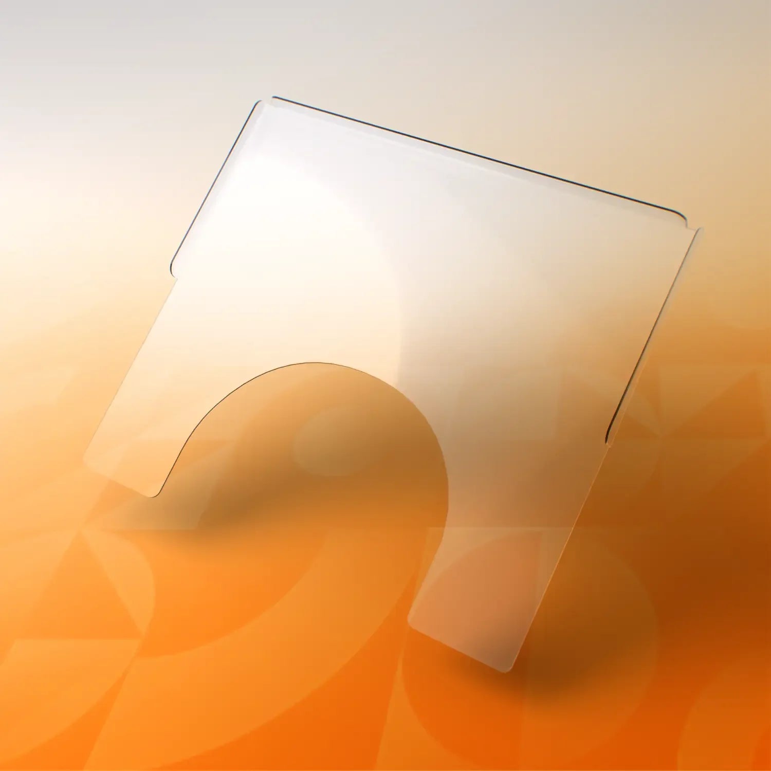 Large transparent wheelchair tray with cut-out, shown on a gradient orange background