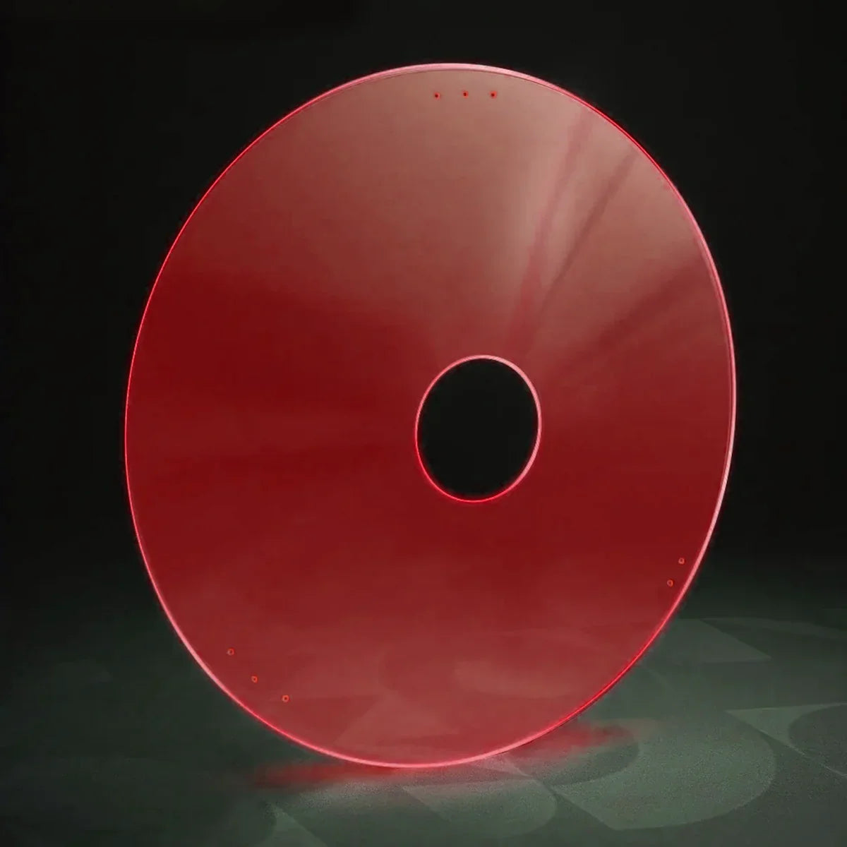 Red wheelchair spoke guard with central hole and mounting holes, durable accessory for wheelchair wheels
