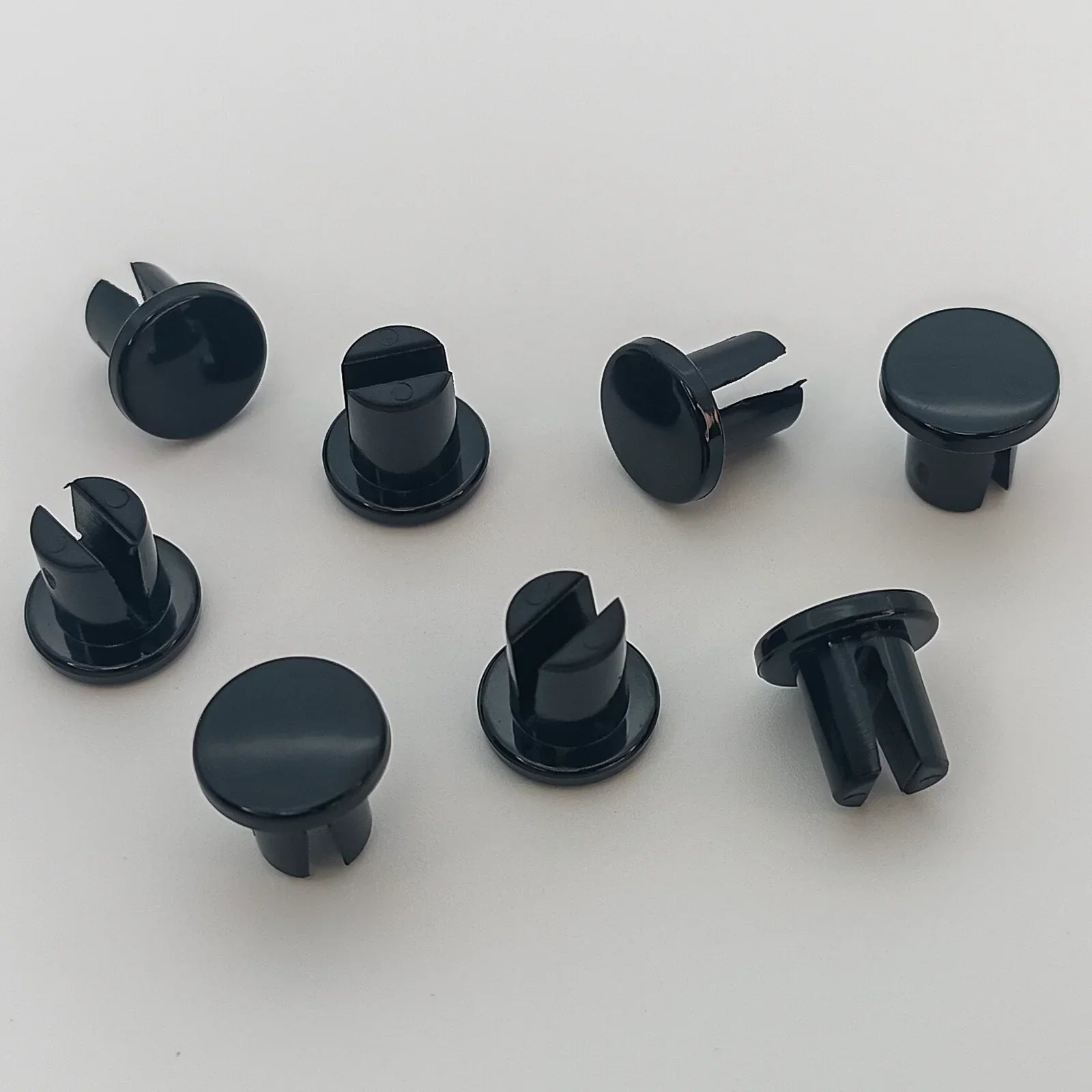 Black plastic wheelchair accessory fasteners for secure attachment, durable parts for mobility equipment