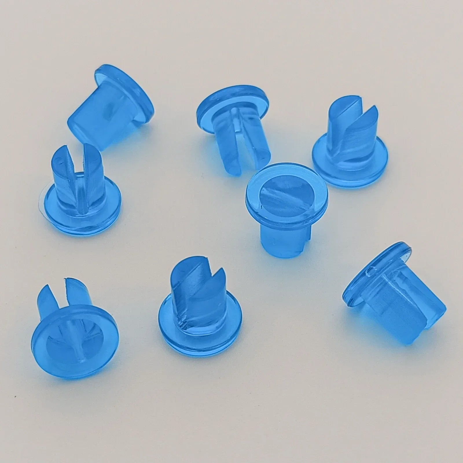 Blue plastic wheelchair spoke guards for safety and durability