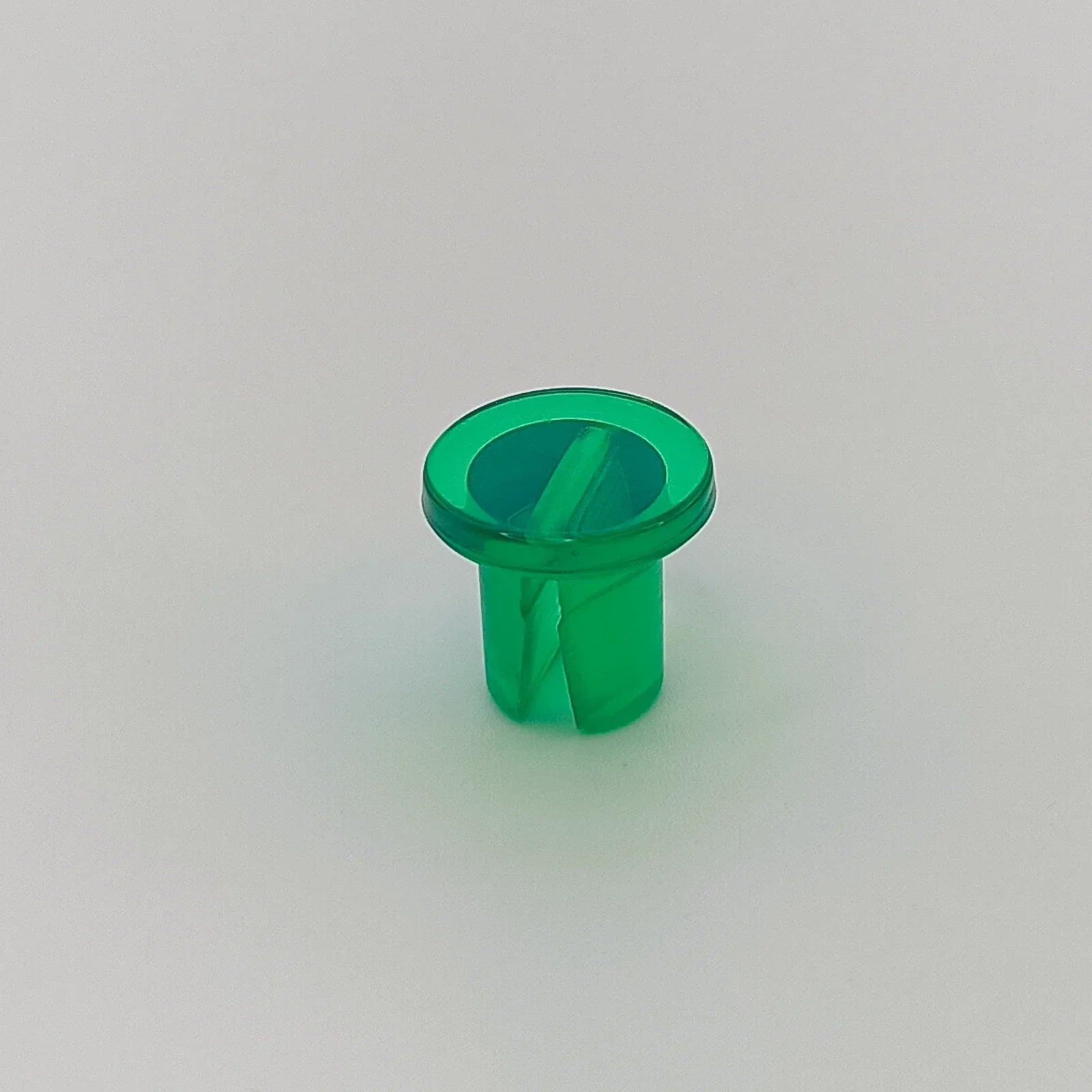 Green plastic wheelchair accessory component for durable mobility parts