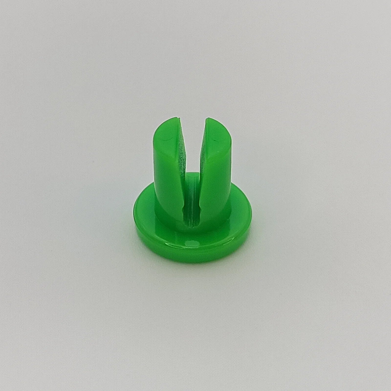 Bright green wheelchair spoke guard accessory for wheelchair safety and protection