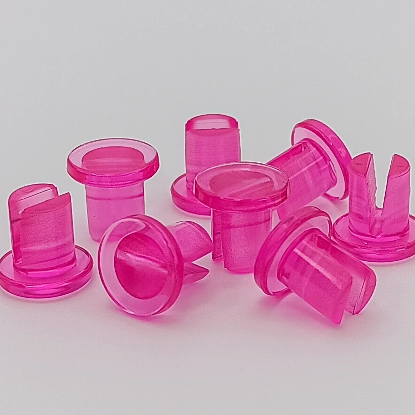 Pink wheelchair spoke guards for safety and style, durable plastic accessories for mobility equipment