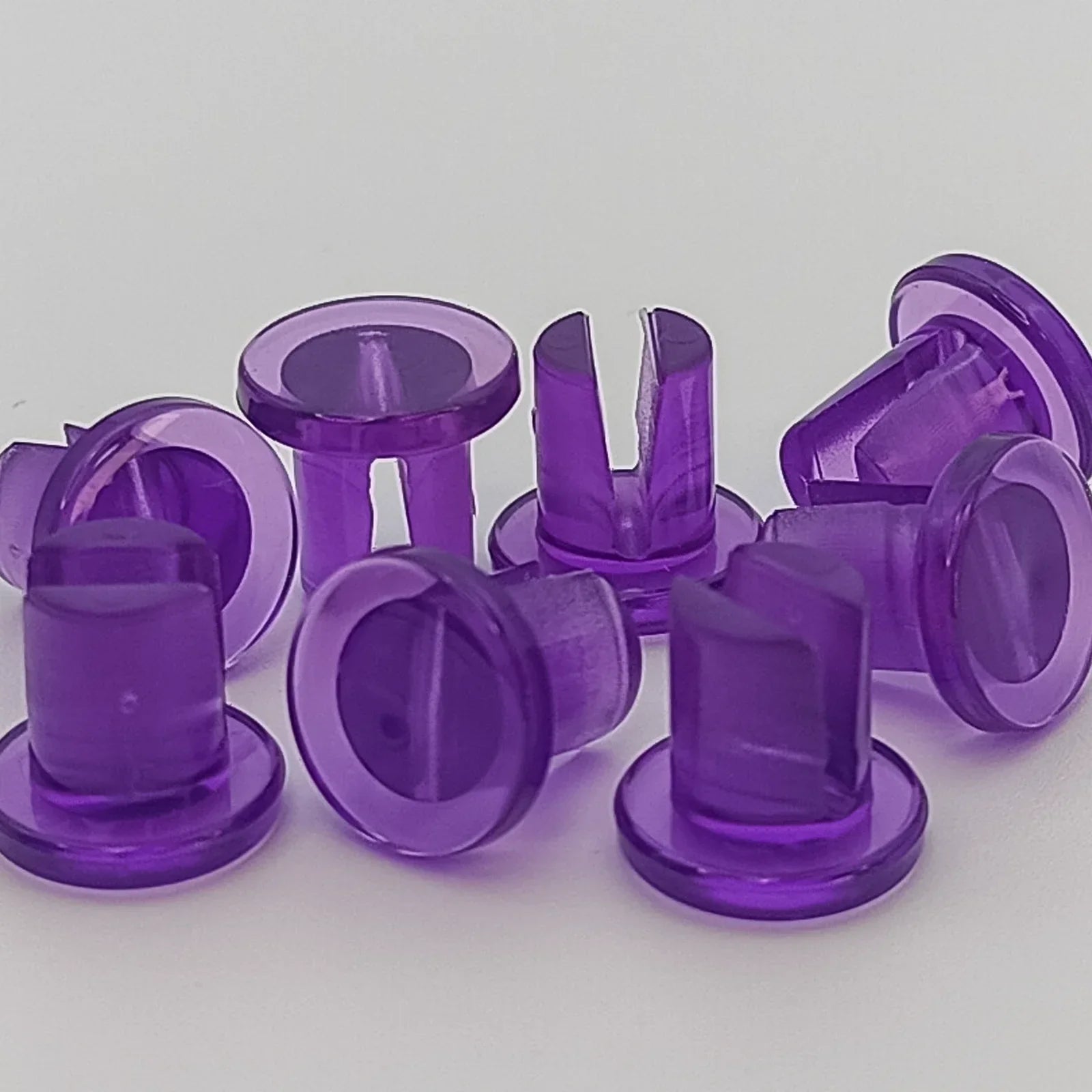 Purple wheelchair spoke guards for safety and style, durable plastic accessories for mobility devices