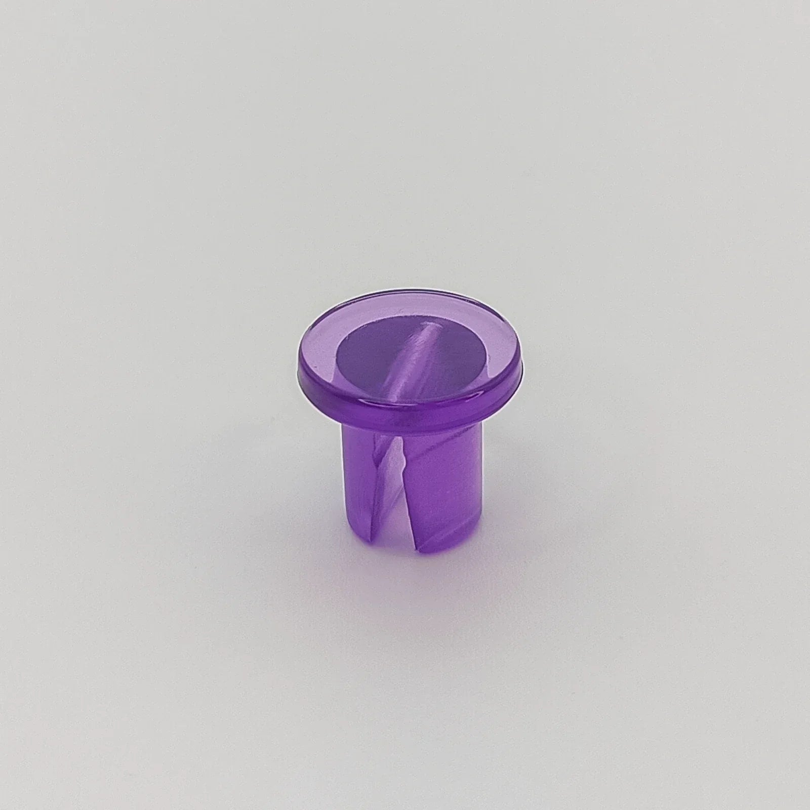 Purple plastic wheelchair spoke guard accessory for wheel safety and protection