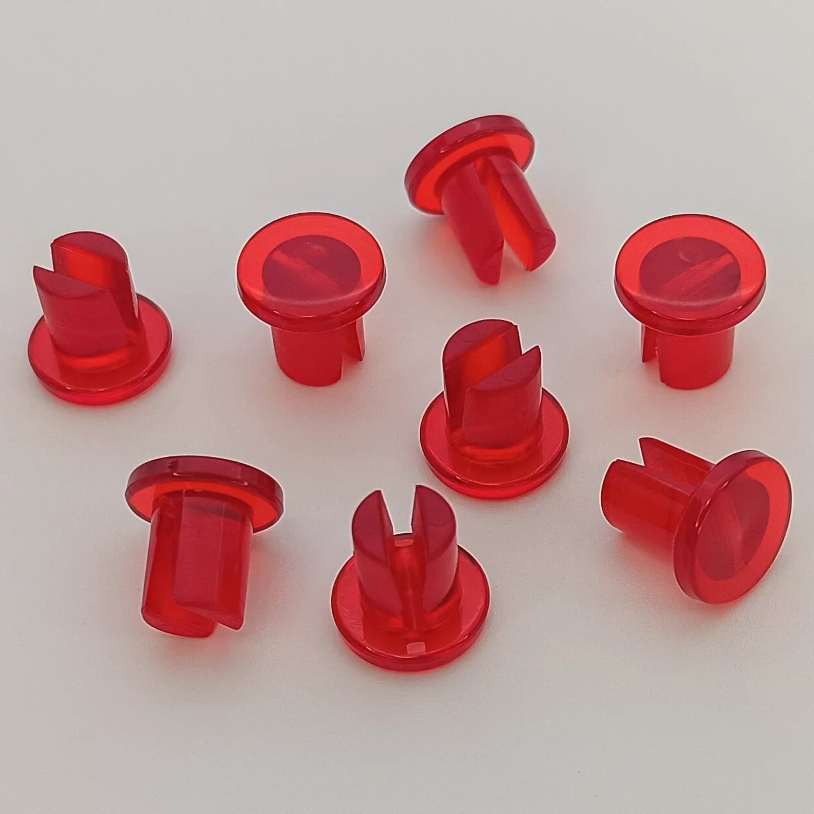 Red plastic wheelchair spoke guards for safety and durability