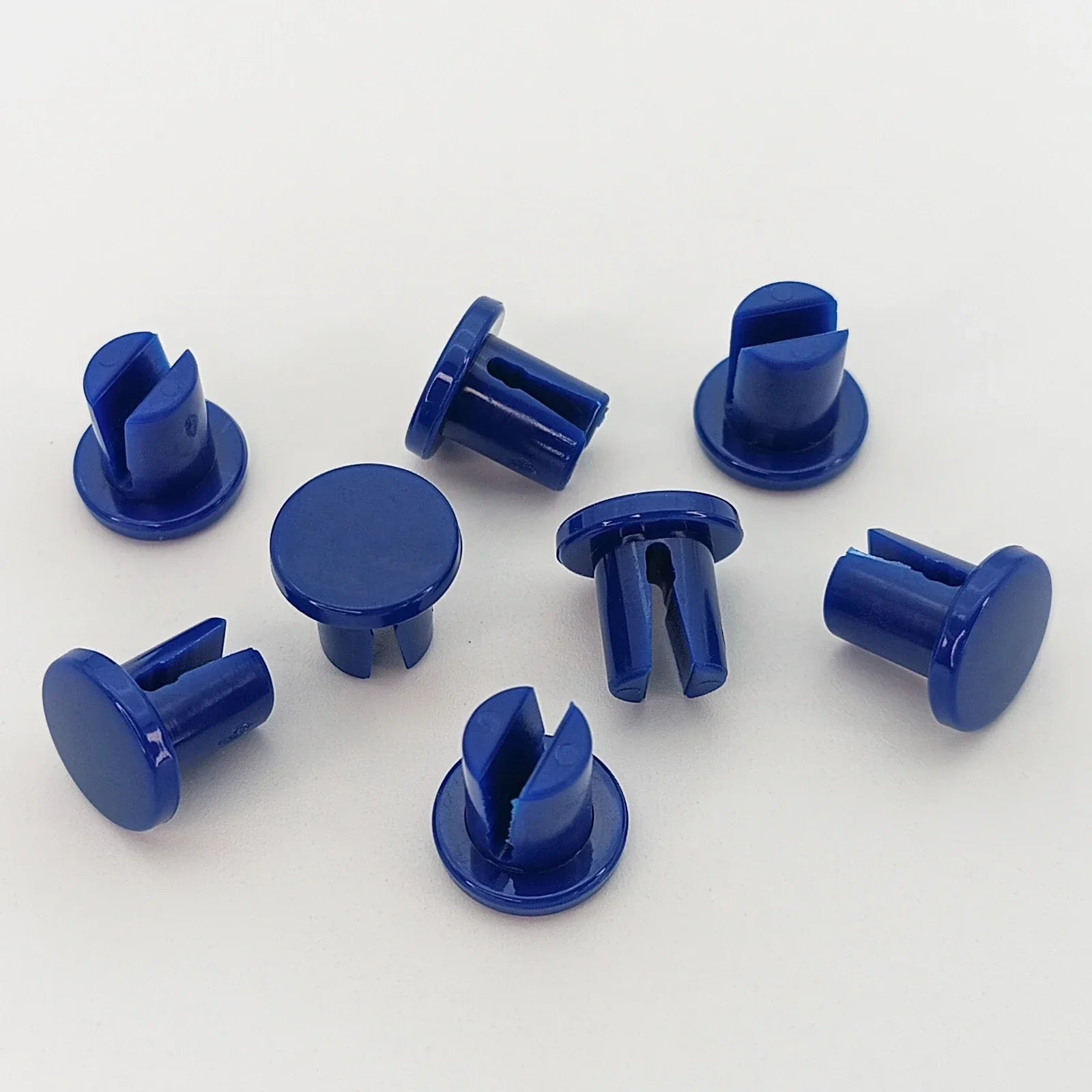 Blue plastic wheelchair spoke guards for safety and durability