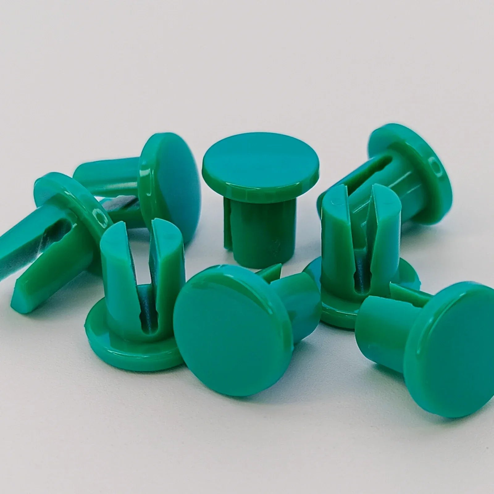 Green plastic wheelchair spoke guards for durable mobility accessories