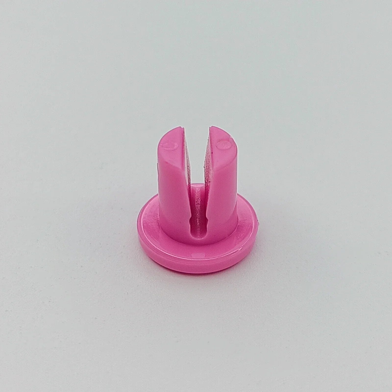 Pink wheelchair spoke guard accessory for wheelchair wheels, durable plastic part