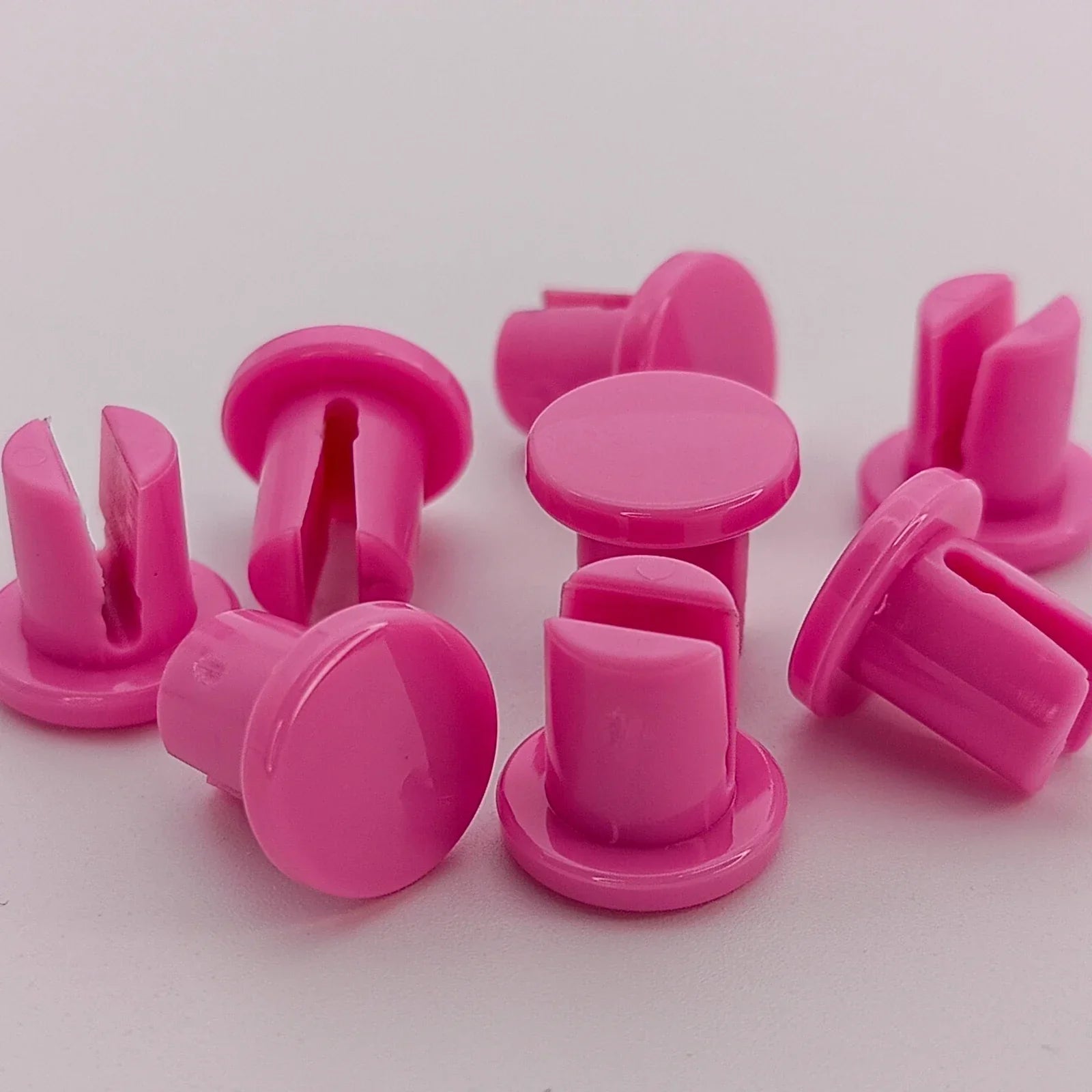Bright pink wheelchair spoke guards for safety and style, durable plastic accessories for mobility devices