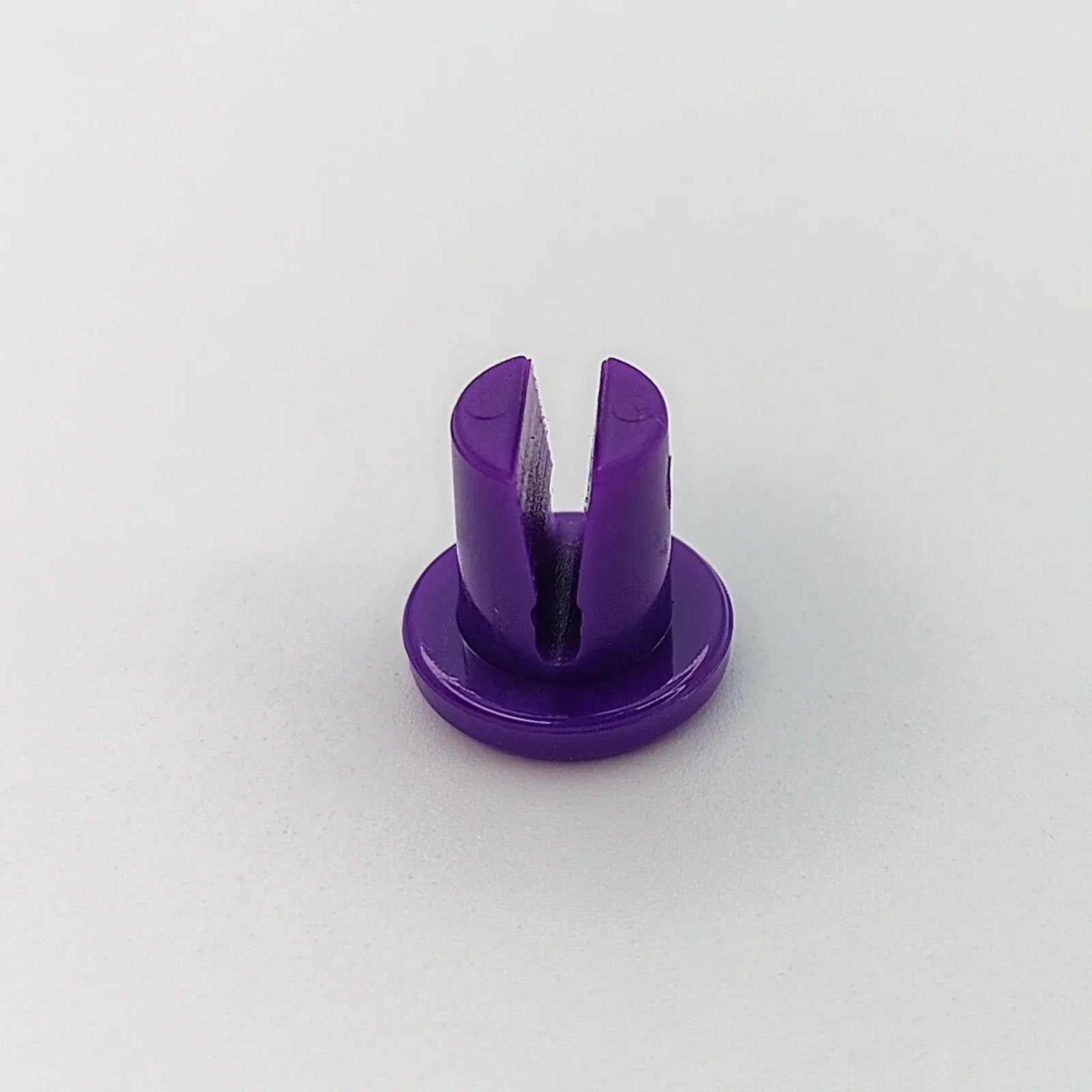 Purple wheelchair spoke guard accessory for wheel safety and protection