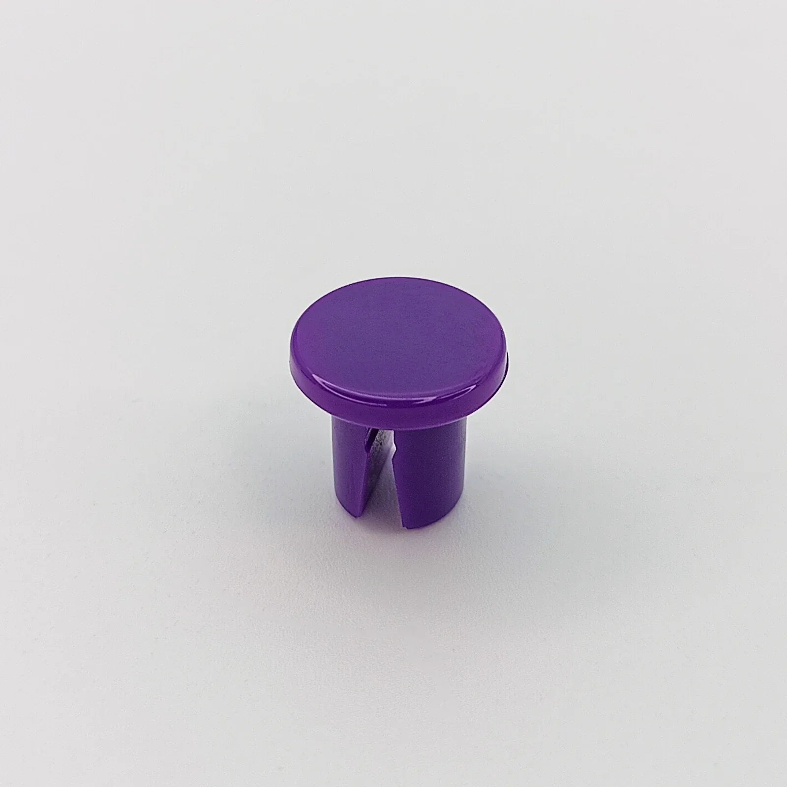 Purple plastic wheelchair accessory cap for spoke guards or tray mounts